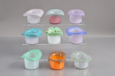 Lot 272 - A collection of nine Vasart / Monart Scottish glass top hat shaped posy pots or vases