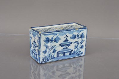 Lot 367 - A Delft style blue and white pottery flower brick