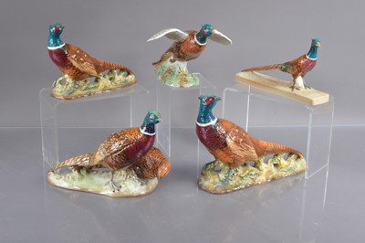 Lot 412 - A good collection of five different Beswick peasant figures
