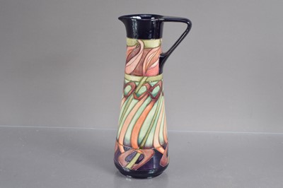 Lot 421 - A Moorcroft Pottery "Tulip Weaver" trial ewer shape vase dated 19-5-10
