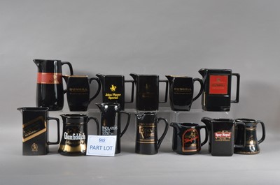 Lot 61 - A large collection of ceramic water jugs