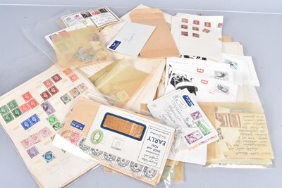 Lot 164 - An assortment of loose World and GB postage stamps