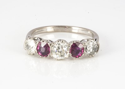 Lot 103 - An 18ct white gold ruby and diamond five stone dress ring