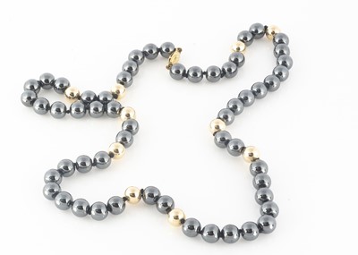 Lot 107 - A haematite and 9ct gold bead necklace