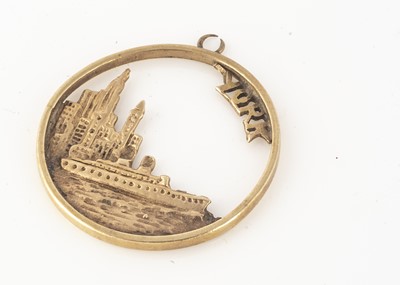 Lot 129 - A continental 14K marked New York openwork pendant
