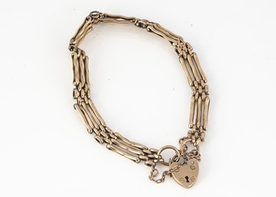 Lot 146 - A 9ct gold three bar gate bracelet