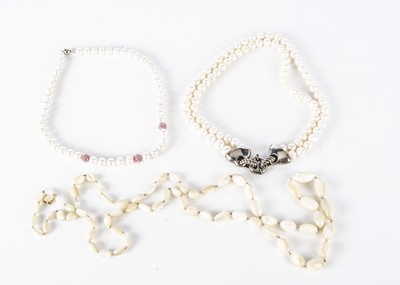 Lot 160 - A string of mother of pearl ovoid knotted, strung beads