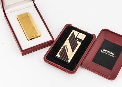 Lot 172 - A Cartier gold plated lighter
