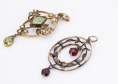 Lot 256 - Two  9ct gold Art Nouveau open work oval pendants