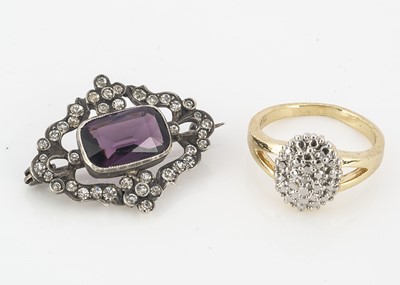Lot 196 - A 19th Century openwork paste silver set brooch