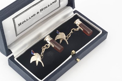Lot 225 - A pair of Holland and Holland silver and agate cufflinks