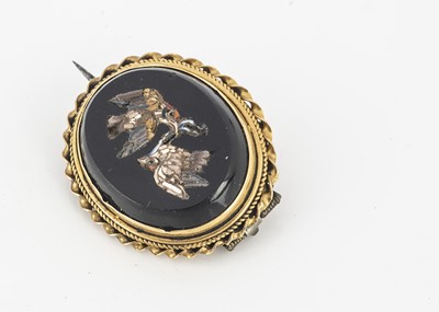 Lot 243 - An Italian micro mosaic oval brooch