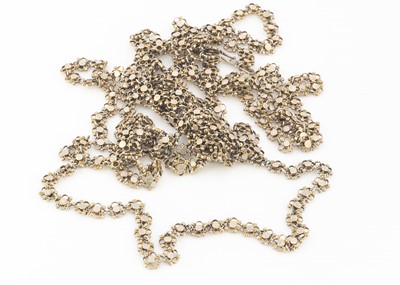 Lot 254 - A silver and silver gilt guard chain