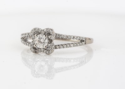 Lot 256 - An 18ct white gold diamond dress ring