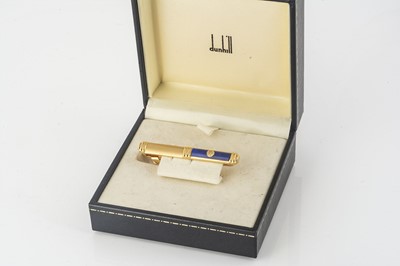 Lot 264 - A contemporary Dunhill gilt metal and enamel tie clip