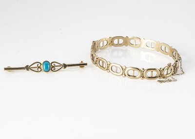 Lot 275 - A 9ct gold oval openwork bangle