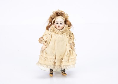 Lot 658 - A German bisque headed dolls’ house doll