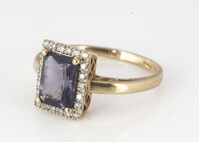Lot 315 - A 9ct gold amethyst and diamond bezel cluster ring