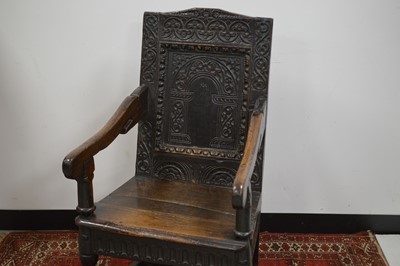 Lot 24 - A 17th  Century English oak wainscot armchair
