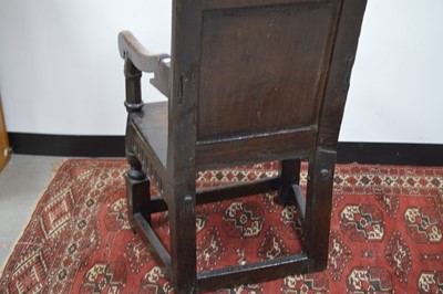 Lot 24 - A 17th  Century English oak wainscot armchair