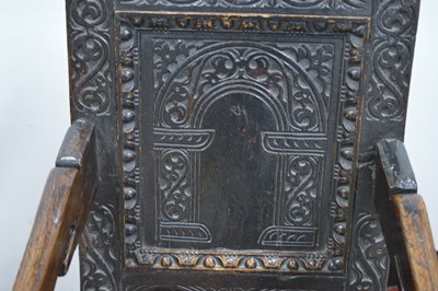 Lot 24 - A 17th  Century English oak wainscot armchair