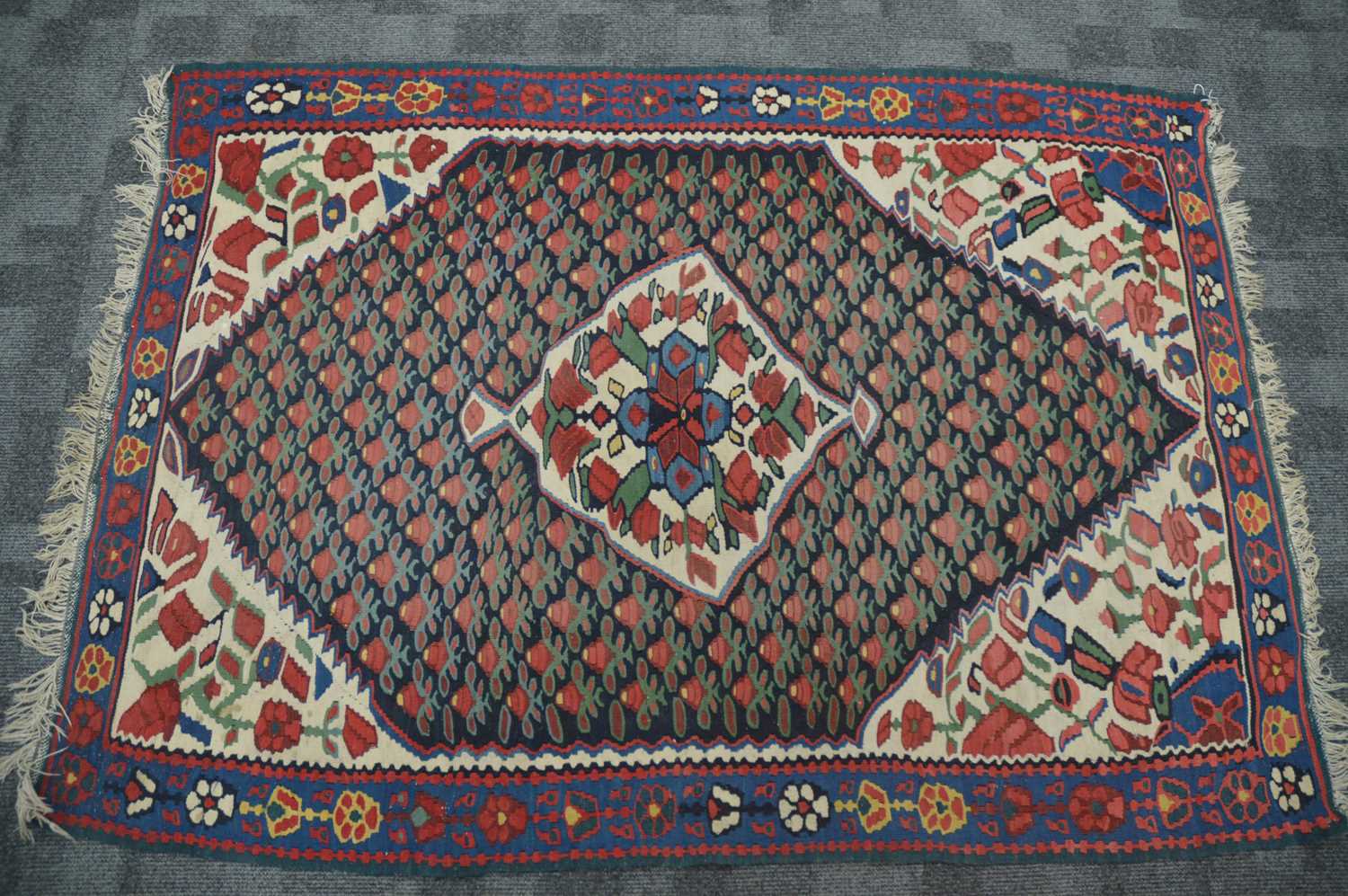Lot 51 - A cream ground hand-knotted wool Kilim