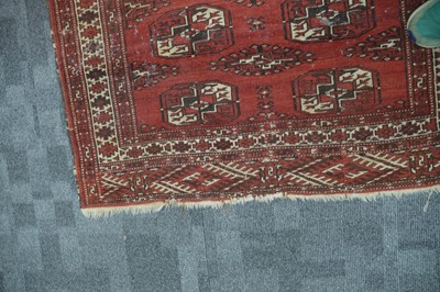 Lot 52 - An antique red ground Bokhara wool rug