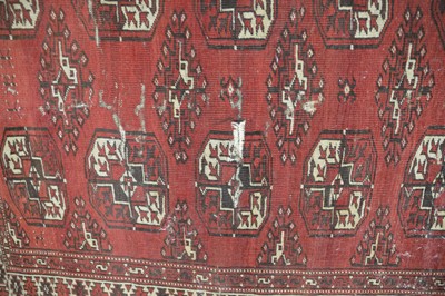 Lot 52 - An antique red ground Bokhara wool rug