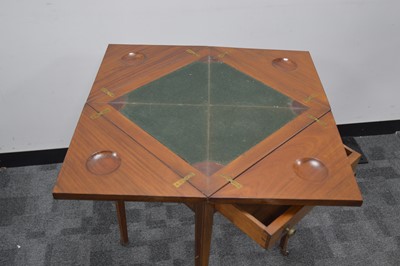 Lot 59 - An Edwardian mahogany envelope games or card table