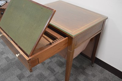 Lot 62 - A George III  19th Century cross-banded mahogany work table in the manner of Gillows