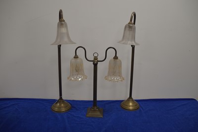 Lot 75 - A pair of brass table lights