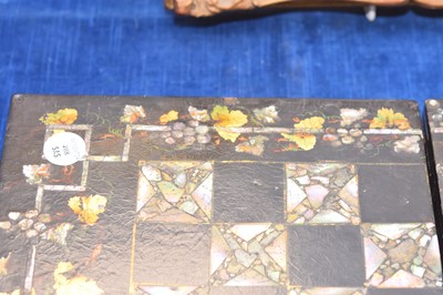 Lot 408 - A mid-19th Century black lacquer and abalone shell inlaid games board