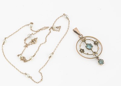 Lot 77 - A 9ct gold paste set openwork pendant