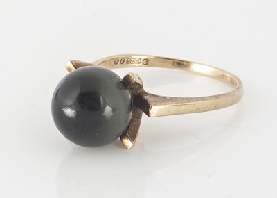 Lot 97 - A 9ct gold tigers eye dress ring