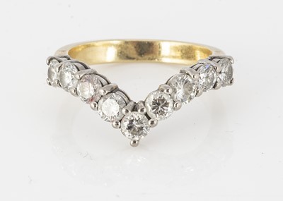 Lot 334 - An 18ct gold diamond set wishbone half eternity ring