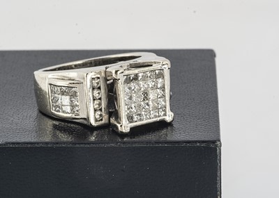 Lot 336 - A contemporary 14ct diamond dress ring