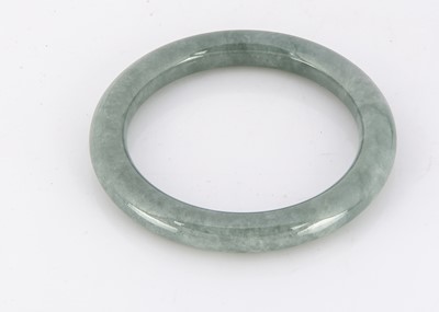 Lot 325 - A Chinese Jadeite Jade bangle