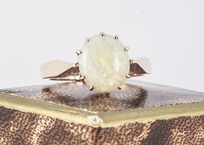 Lot 344 - A 9ct gold circular opal ring