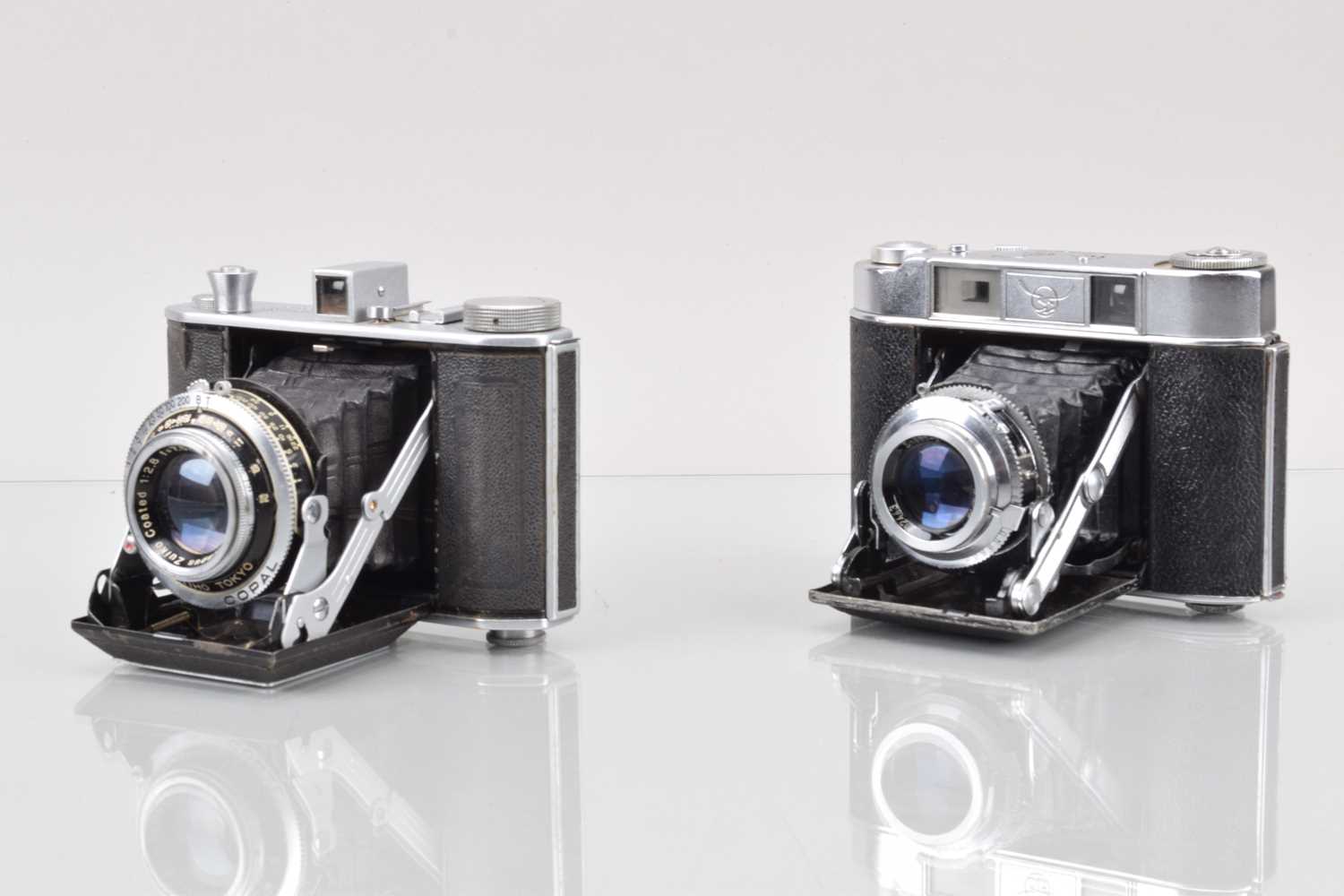 Lot 8 - Two Folding Cameras