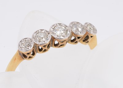 Lot 382 - An early 20th century old cut diamond five stone dress ring