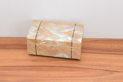 Lot 292 - An art deco mother of pearl and abalone domed top rectangular hinged box