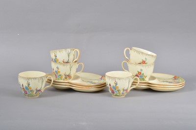 Lot 19 - A set of six Crown Devon tea plates and cups
