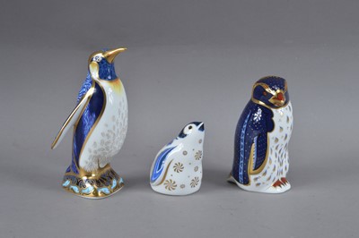 Lot 78 - Three Royal Crown Derby bone china paperweights