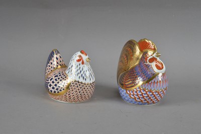 Lot 79 - Two Royal Crown Derby bone china paperweights