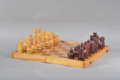 Lot 123 - A 1960's or 1970's wooden chess set and board