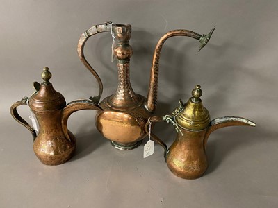 Lot 133 - Two vintage Middle Eastern copper coffee pots and a water pot