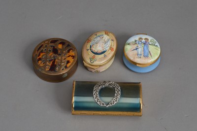 Lot 142 - A Kigu enamelled gilt metal oval make-up canister