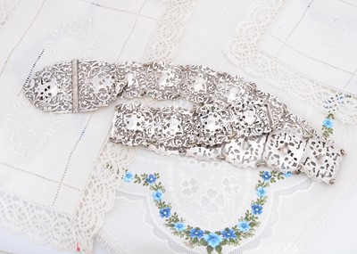 Lot 448 - A silver plated belt