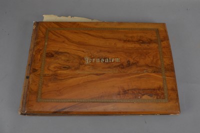 Lot 174 - A Jerusalem album containing pressed flowers