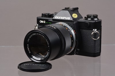 Lot 5 - An Olympus OM-2 Spot/Program SLR Camera